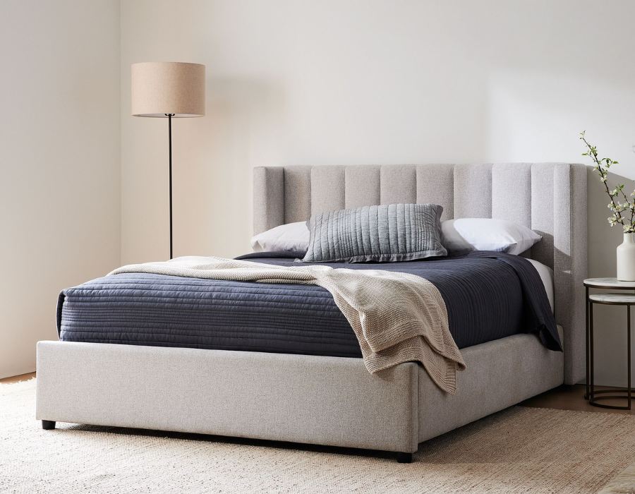 low-profile bed with no-show legs and tufted detailing