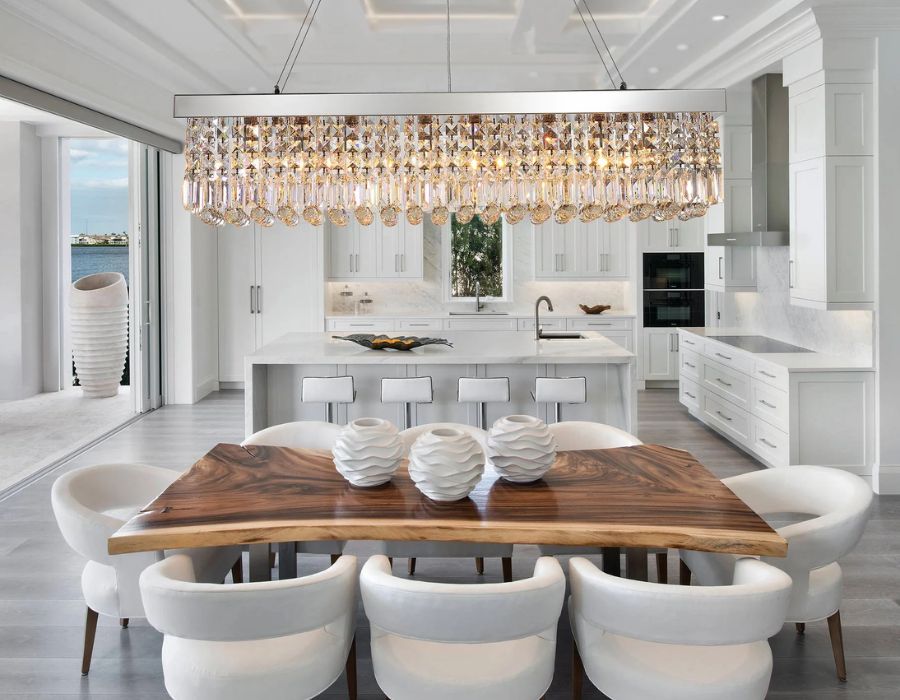 kitchen and dining featuring a rectangular raindrop chandelier